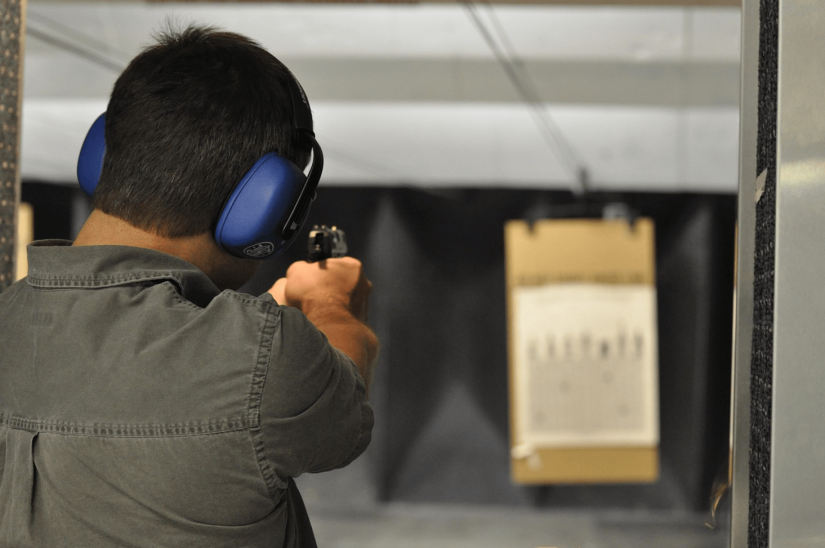 A man at a gun range practicing self defense in Missouri.